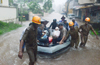 Boats used to ferry stranded public, school children at Alake, Kudroli